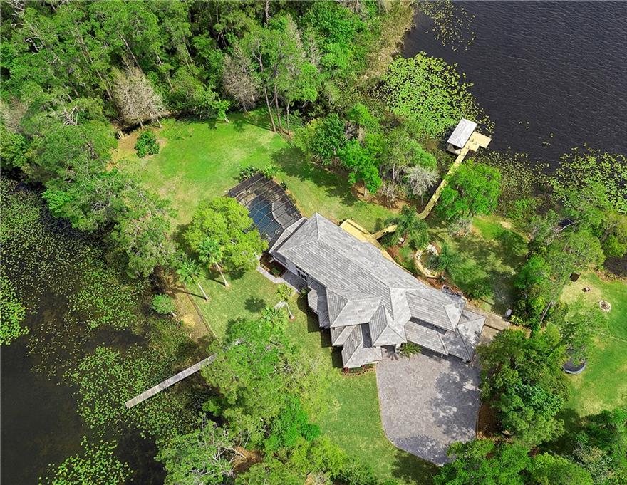 Aerial view of a lakefront home Kona worked on